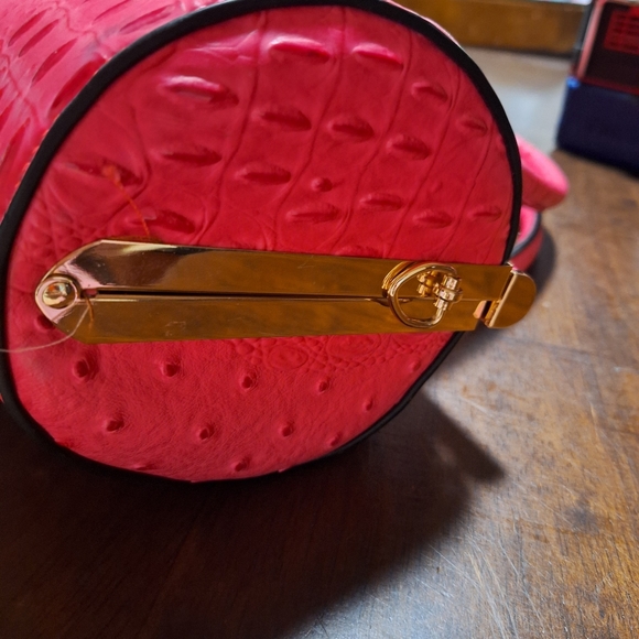 Ruby is a unique handbag that is made of faux leather.  She has a center jeweled - Picture 3 of 7